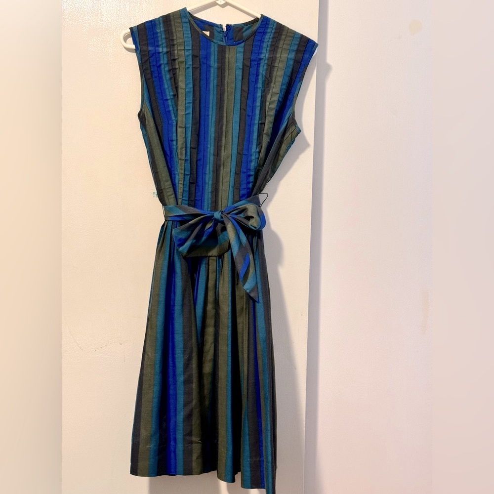 Mindy Ross medium retro dress with tie bow at waist. Form fitted.
